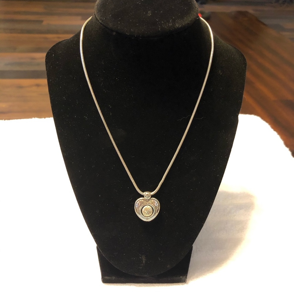 Spinning heart necklace